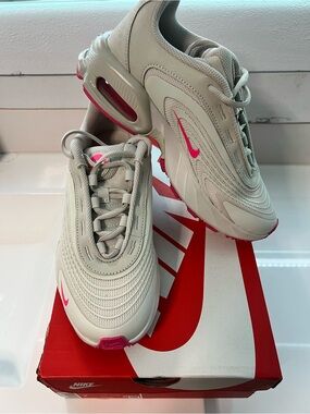 Nike Sneakers in Light Gray with Pink Accents